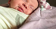 Za'Mora joined the competition — help win amazing prizes! baby, sleeping, blanket, headband, infant, wrapped, soft, peaceful, face, closeup, indoors, newborn, cute, resting, skin, child, portrait, adorable, cozy, light