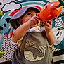 Matteo joined the competition — help win amazing prizes! baby, child, toy, play_mat, whale, hat, colorful, rainbow, cloud, animal, cute, infant, clothing, pattern, happy, indoors, playful, smiling, portrait, hand