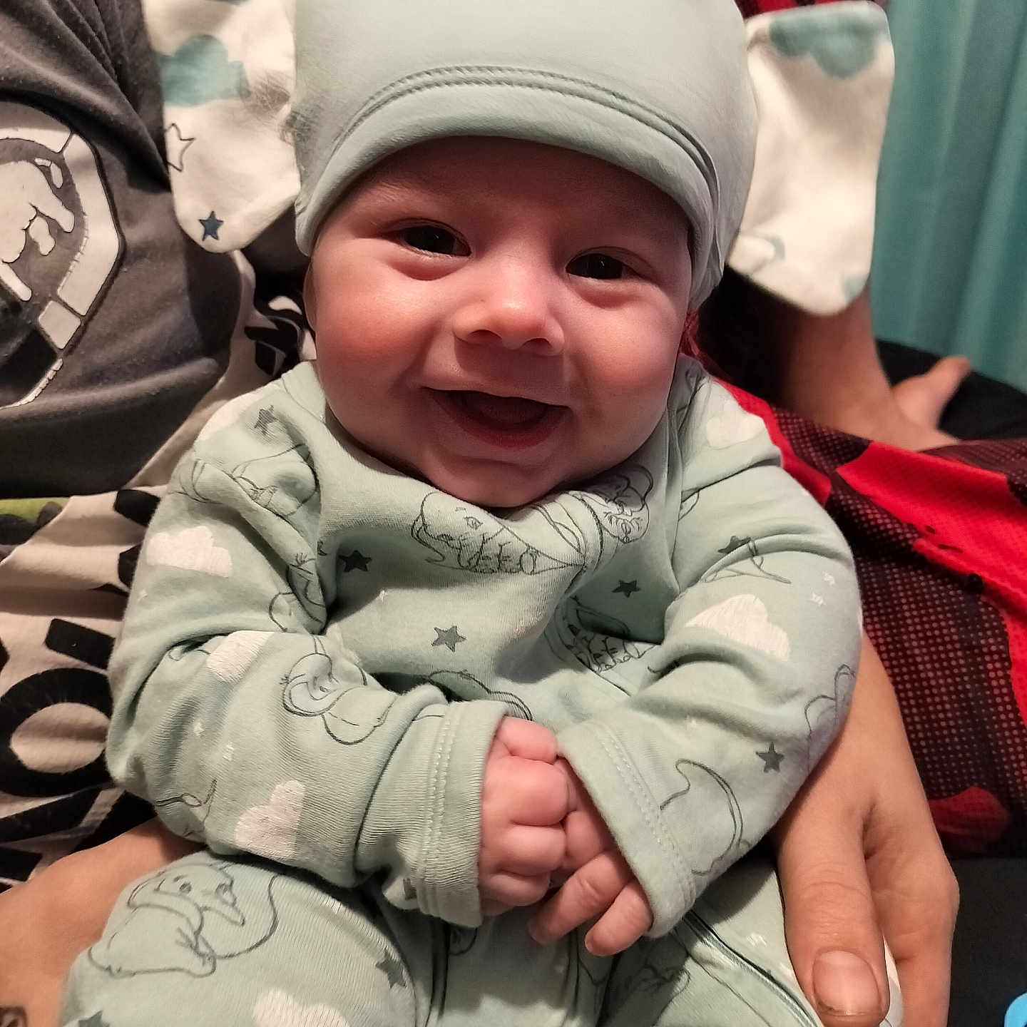 Julien joined the competition — help win amazing prizes! baby, babylaughing, bodypart, bonnet, cap, clothing, face, finger, hand, happy, hat, head, laughing, newborn, pants, person, photography, plate, portrait, smile