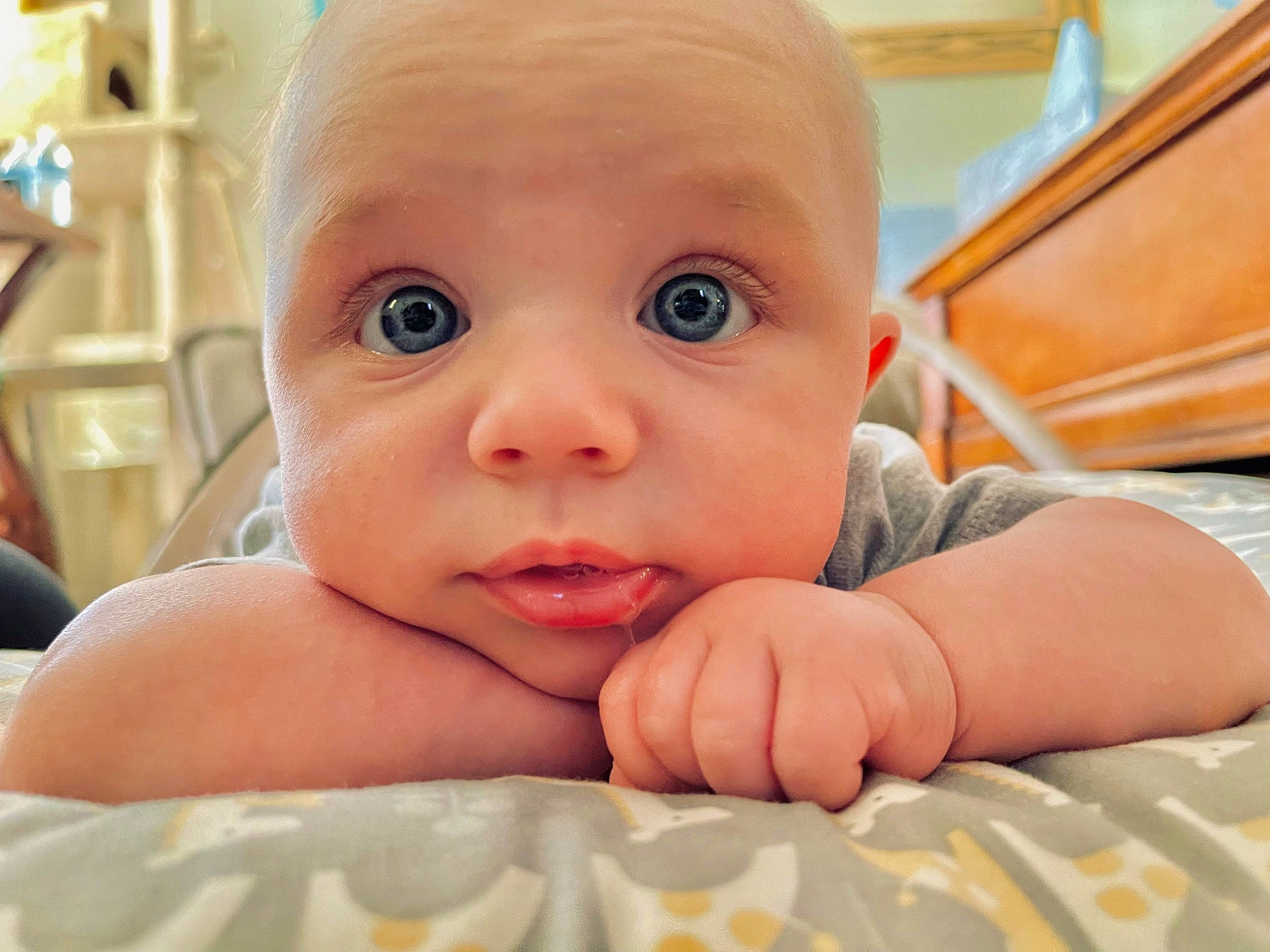 Kaiser is registered to the contest to win money with this photo: baby, baby_toddler_clothing, cheek, child, chin, comfort, eyebrow, eyelash, finger, fun, gesture, happy, iris, lip, mouth, nose, person, skin, thumb, toddler