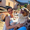Urkane a rejoint le concours — aidez-le/la à gagner de superbes lots ! animal, backyard, blue_sky, casual_clothing, chair, daylight, dog, fur, happy, leisure, nature, outdoor, pet, portrait, relaxing, sitting, smile, summer, sunlight, woman