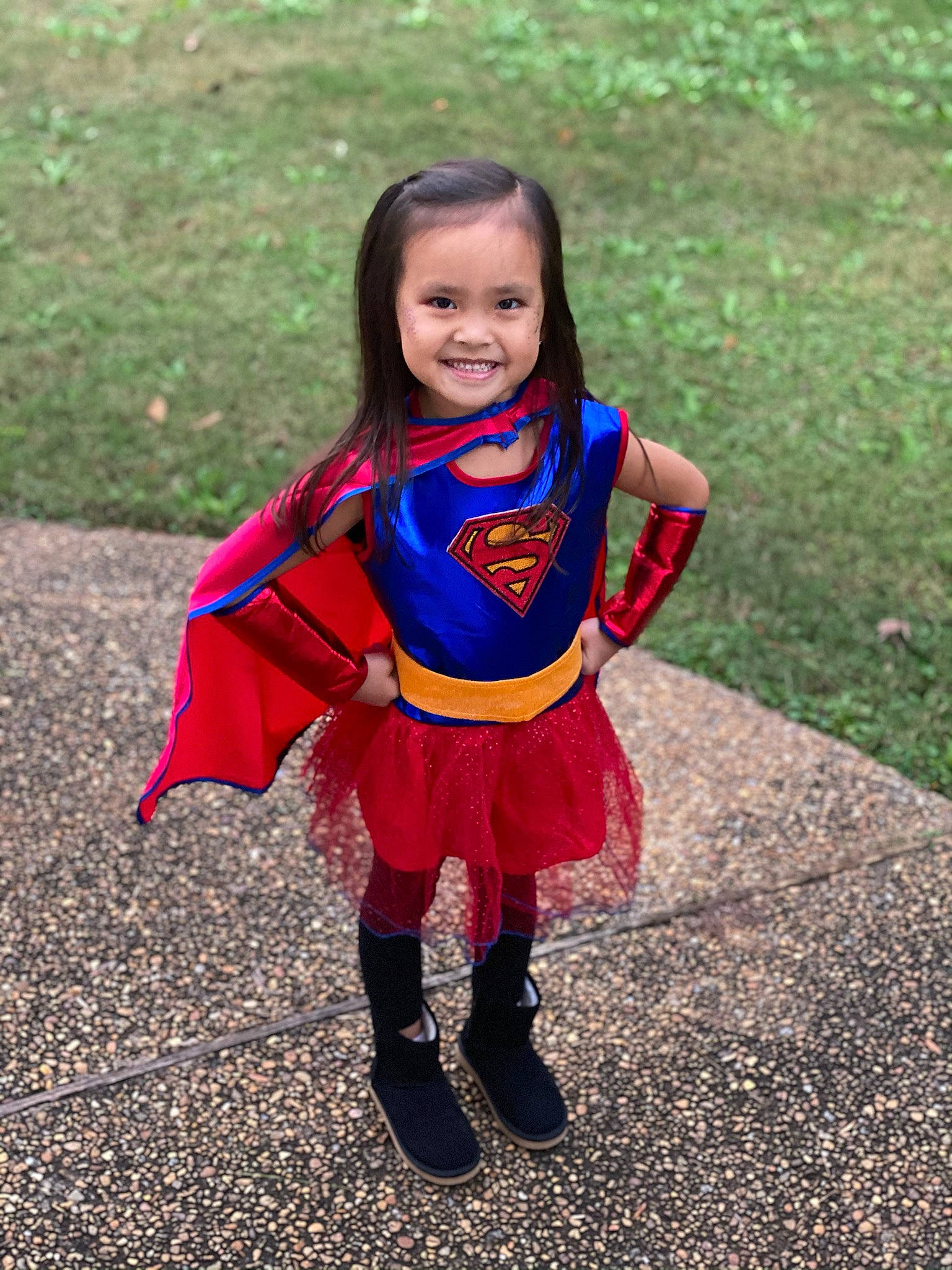 Kenlee is registered to the contest to win money with this photo: baby_toddler_clothing, electric_blue, face, fun, grass, hair, happy, head, human_body, iris, joy, leisure, magenta, outerwear, people_in_nature, person, shoe, sleeve, smile, sneakers