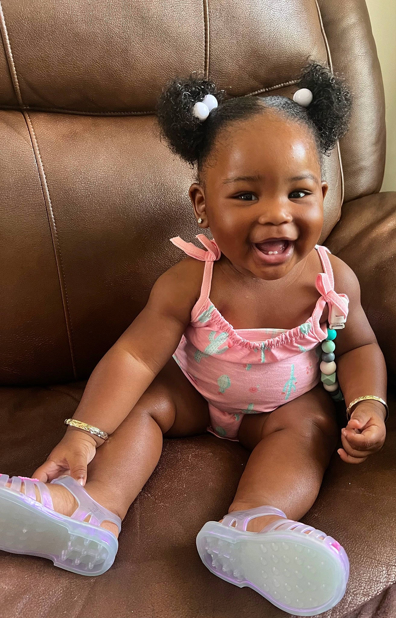 Jeyonnah is registered to the contest to win money with this photo: baby, baby_toddler_clothing, beauty, cheek, child, finger, fun, happy, human_body, iris, joint, leg, mouth, person, pink, skin, smile, sock, textile, thigh