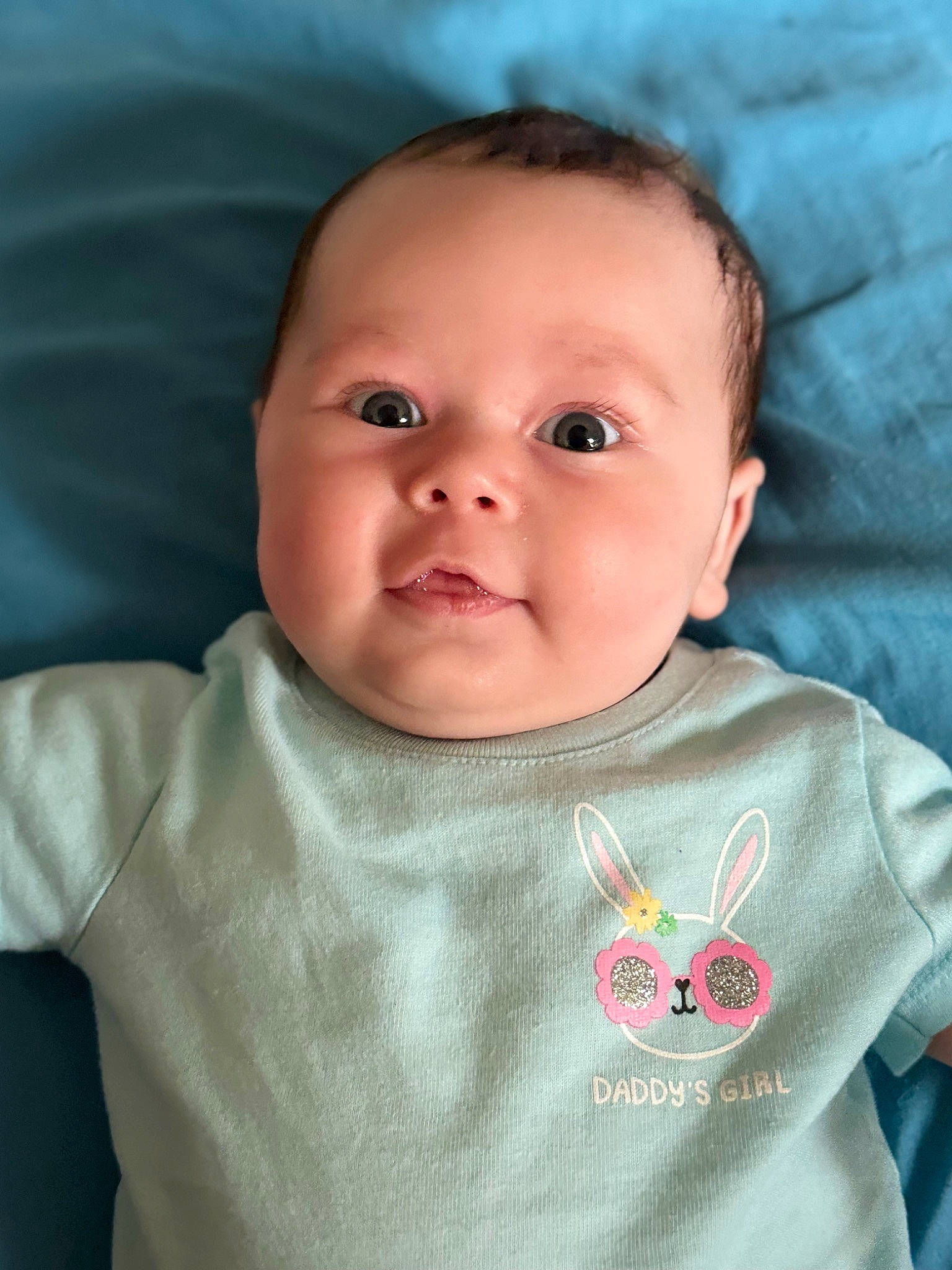 Annalise is registered to the contest to win money with this photo: baby, baby_toddler_clothing, cheek, chin, comfort, eye, eyebrow, face, forehead, hair, hairstyle, head, iris, lip, mouth, neck, nose, person, skin, sleeve