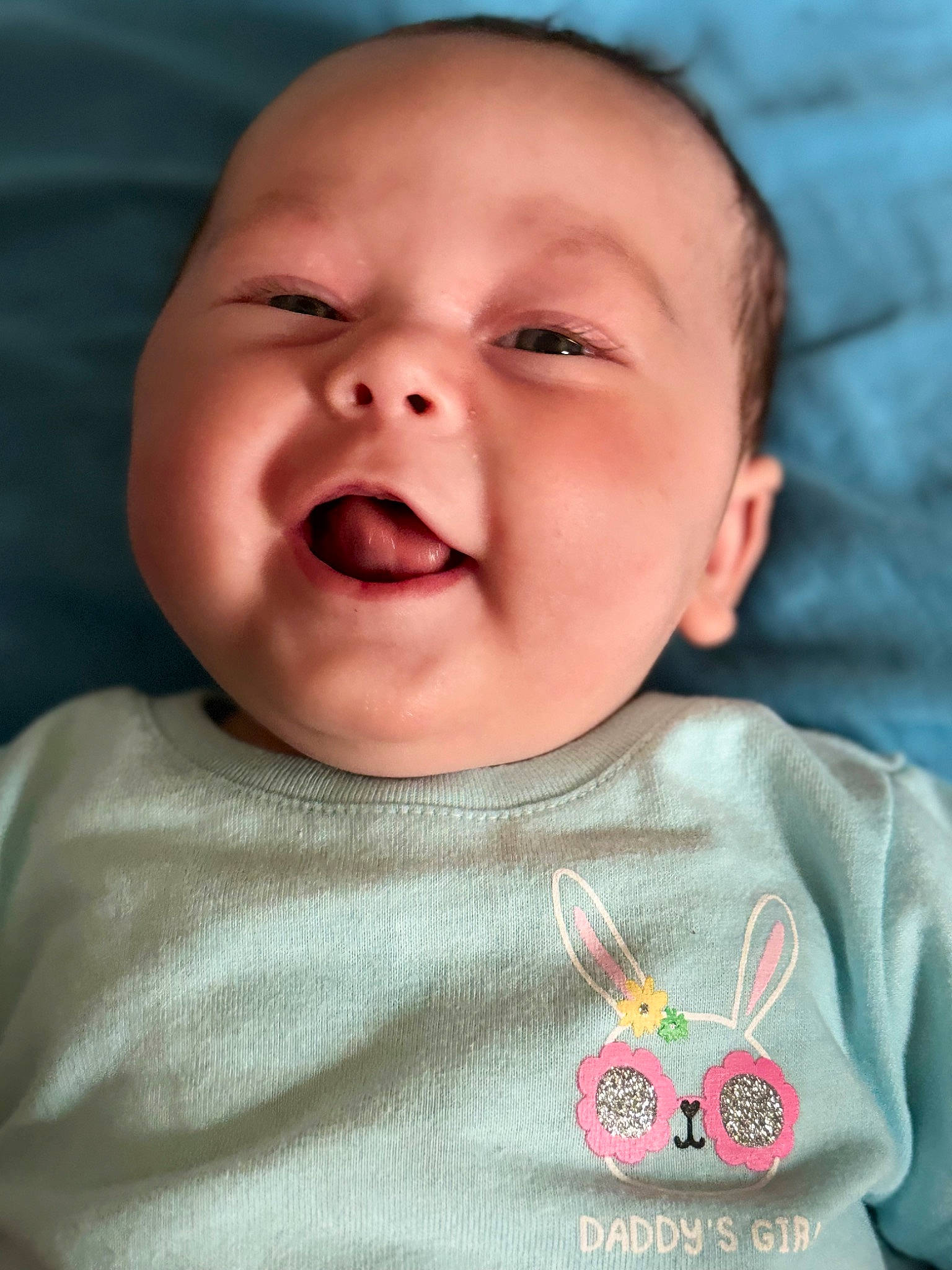 Annalise is registered to the contest to win money with this photo: baby, baby_laughing, baby_toddler_clothing, cheek, child, chin, comfort, eyebrow, face, fun, happy, laugh, lip, mouth, nose, person, skin, sleeve, smile, textile