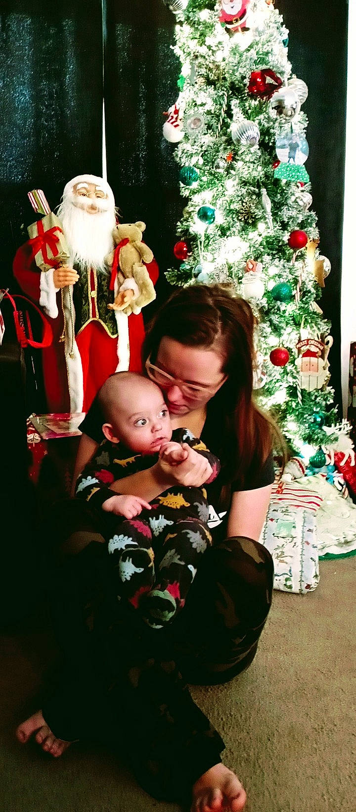 Kalvin joined the competition — help win amazing prizes! baby, christmas, christmas_decoration, christmas_ornament, christmas_tree, event, fun, green, happy, holiday, holiday_ornament, human_body, lap, organ, people, person, plant, santa_claus, standing, tree