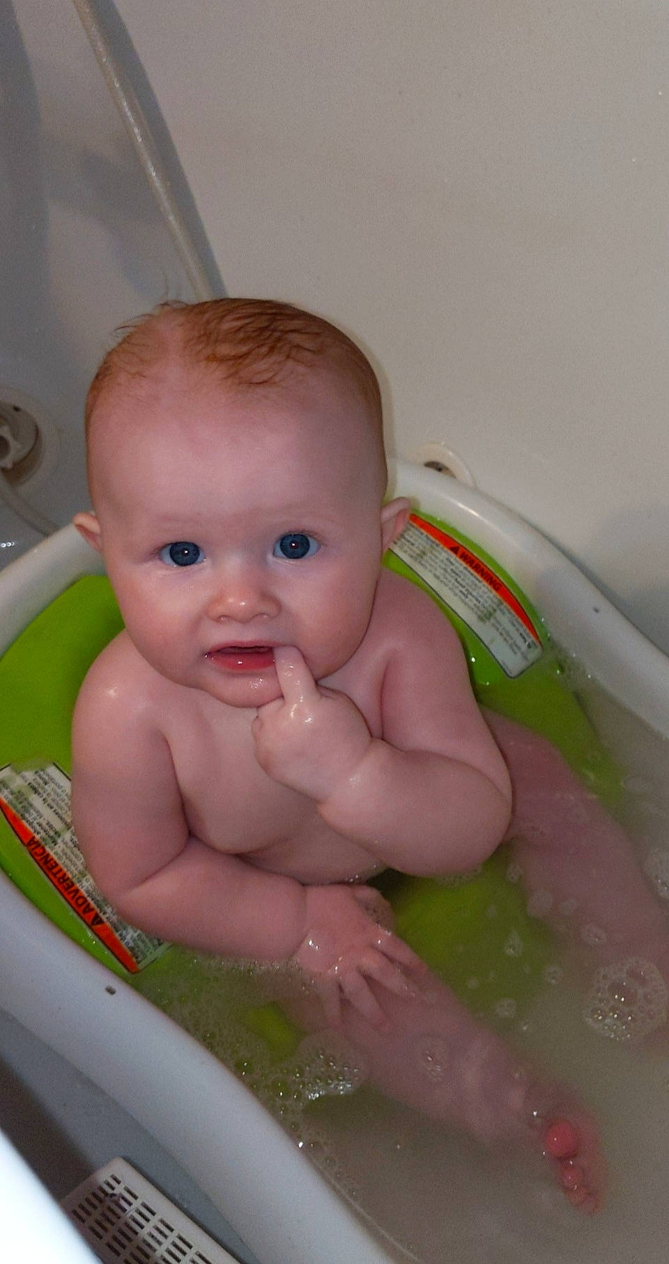 Annalise is registered to the contest to win money with this photo: baby, baby_bathing, bath_toy, bathing, bathroom, bathtub, cheek, chest, eye, face, fluid, fun, liquid, person, plumbing, plumbing_fixture, skin, smile, thumb, toddler