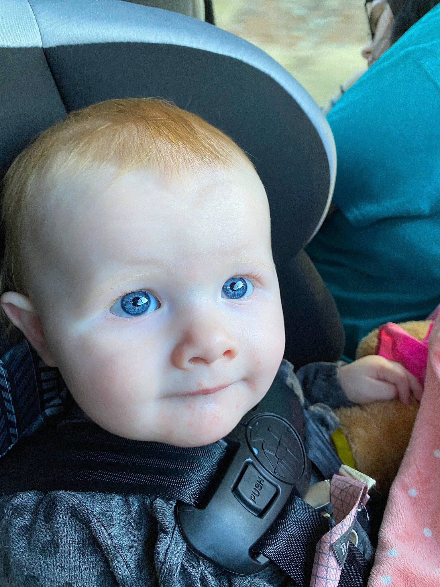 Annalise is registered to the contest to win money with this photo: auto_part, baby, baby_carriage, baby_products, baby_toddler_clothing, car_seat, cheek, child, cool, electric_blue, eyebrow, eyelash, fashion_accessory, fun, hat, nose, person, personal_protective_equipment, skin, sun_hat