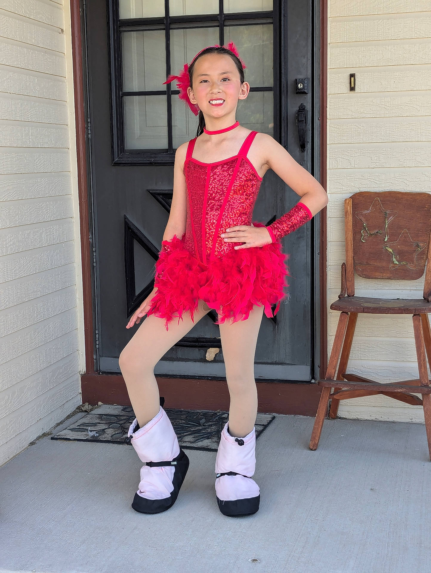 Olivia is registered to the contest to win money with this photo: accessories, child, clothing, corset, dress, eveningdress, face, fashion, featherboa, female, footwear, formalwear, girl, highheel, jewelry, necklace, person, sandal, shoe, wood