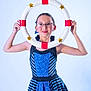 Olivia is registered to the contest to win money with this photo: accessories, bodypart, clothing, dress, eveningdress, face, finger, formalwear, glasses, hand, happy, head, hoop, juggling, person, photography, portrait, sleeve, smile, text