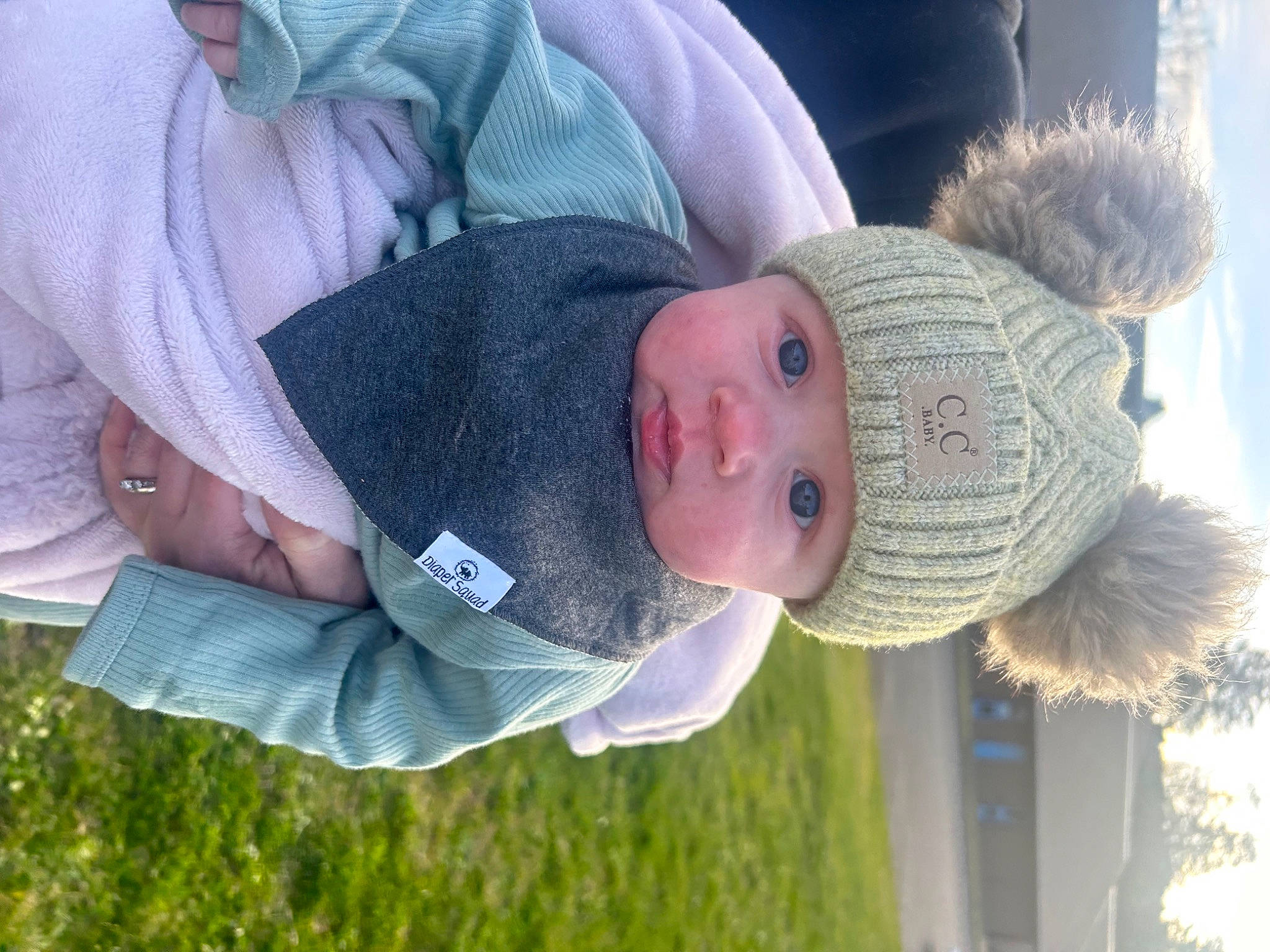 Cheyenne joined the competition — help win amazing prizes! baby, baby_toddler_clothing, cap, child, fun, grass, happy, hat, headwear, knit_cap, leisure, people_in_nature, person, plant, sky, sleeve, toddler, tree, wool