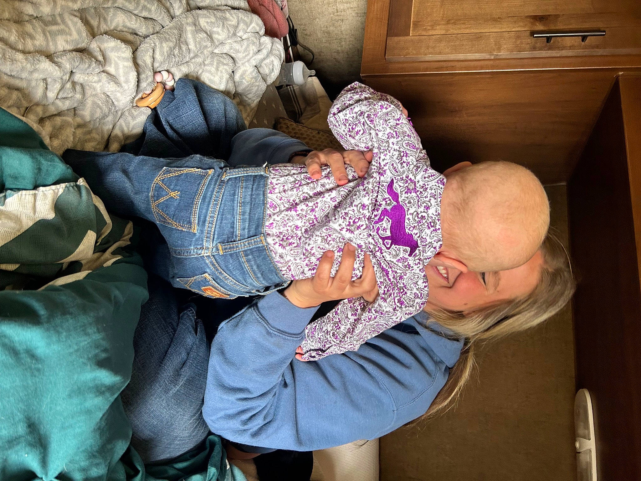 Cheyenne joined the competition — help win amazing prizes! bedding, child, comfort, couch, event, fun, human_leg, joy, lap, linens, nap, pattern, person, purple, room, sitting, sleep, toddler, tree