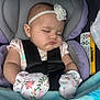 Kaylee joined the competition — help win amazing prizes! baby, sleeping, car_seat, headband, flower, mittens, blanket, child, infant, straps, safety_harness, cute, peaceful, close_up, indoor, portrait, soft_lighting, toddler, clothing, baby_accessories
