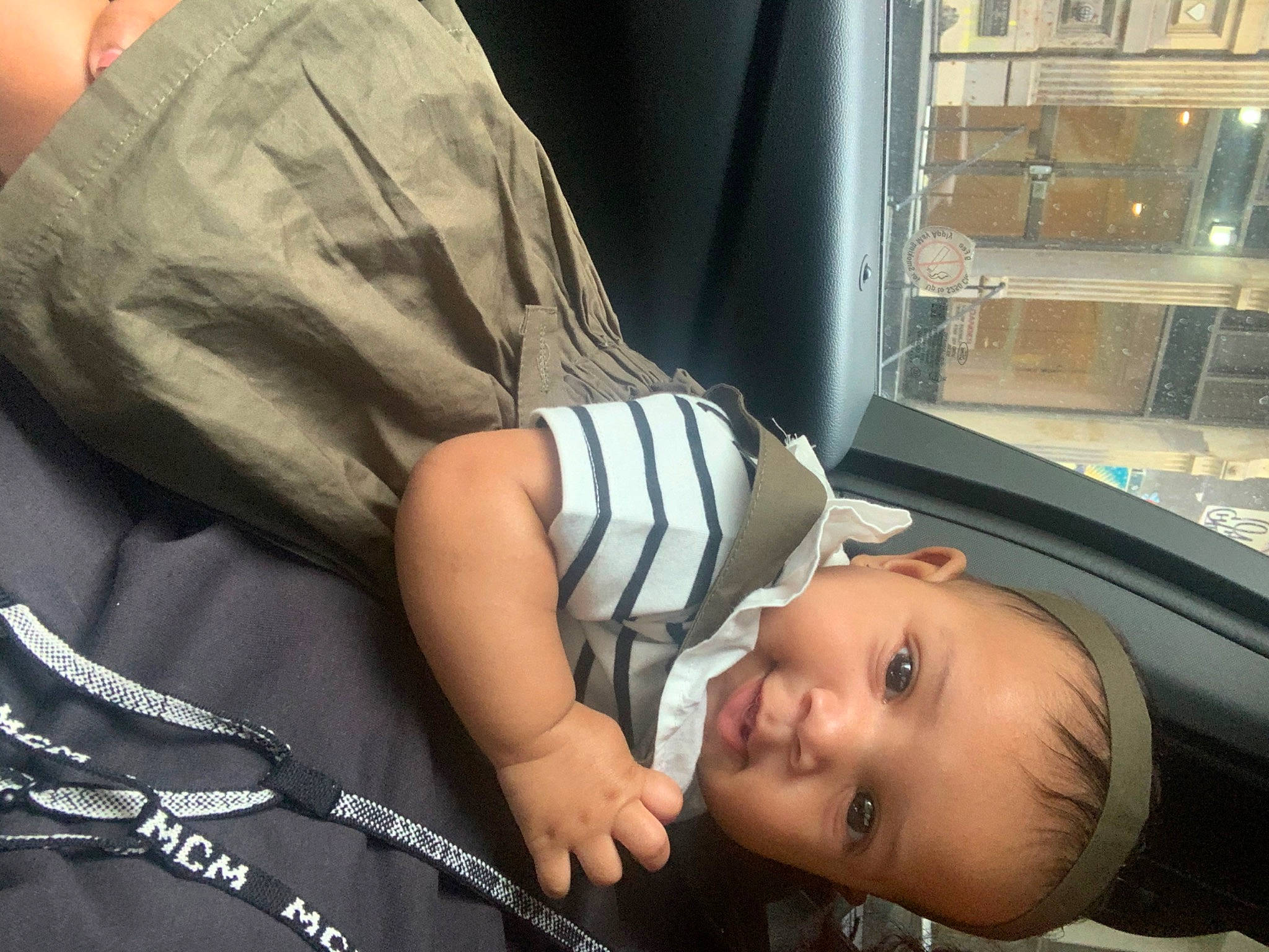 Loyalty is registered to the contest to win money with this photo: baby, baby_products, baby_toddler_clothing, child, comfort, elbow, fun, gas, happy, human_leg, machine, nap, person, sitting, skin, sleeve, smile, t_shirt, toddler, vacation