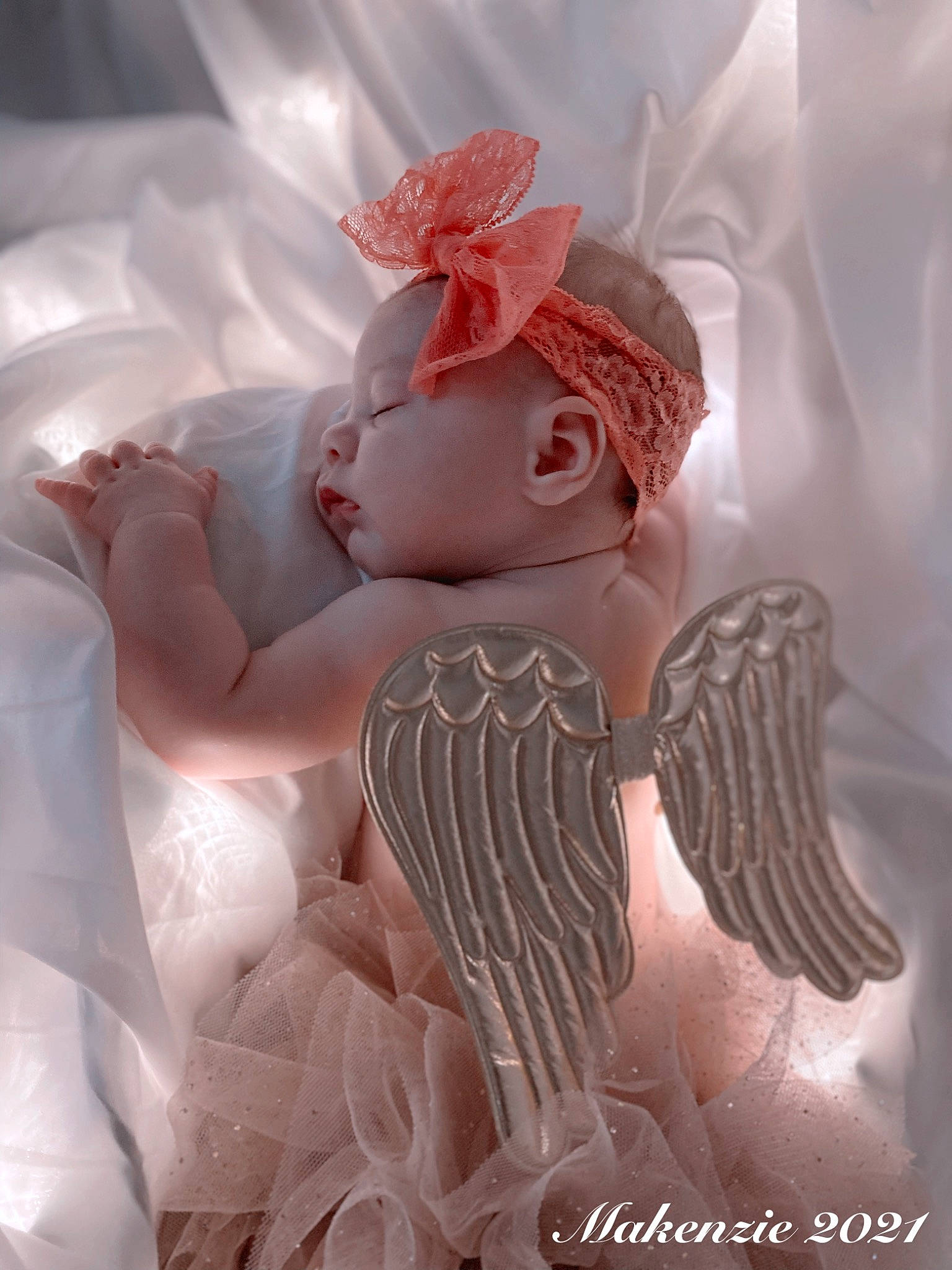 Makenzie joined the competition — help win amazing prizes! baby, baby_toddler_clothing, bridal_accessory, dress, ear, embellishment, eyelash, fawn, feather, hair_accessory, hairstyle, hand, hat, head, headgear, headpiece, human_body, long_hair, person, petal