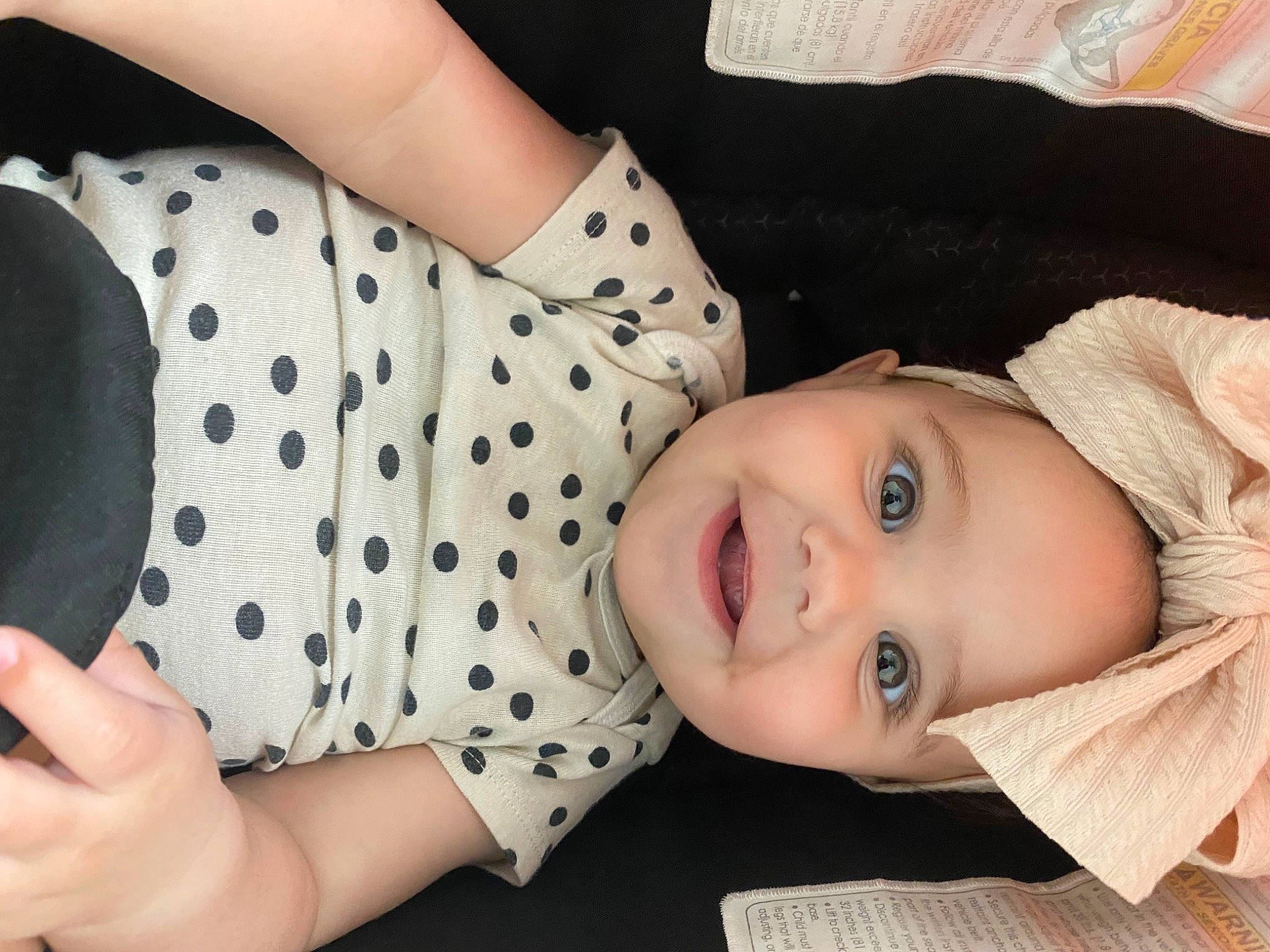 Aria is registered to the contest to win money with this photo: baby_toddler_clothing, child, collar, elbow, eyelash, fashion, gesture, happy, headgear, human, joy, lip, mammal, neck, pattern, person, product, skin, sleeve, smile