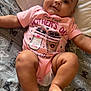 Mayalyn is registered to the contest to win money with this photo: baby, celebration, chubby_cheeks, cozy, cute, face, feet, headband, heart, illustration, infant, legs, love, lying_down, mother's_day, onesie, patterned_blanket, pink_clothing, smile, soft_lighting