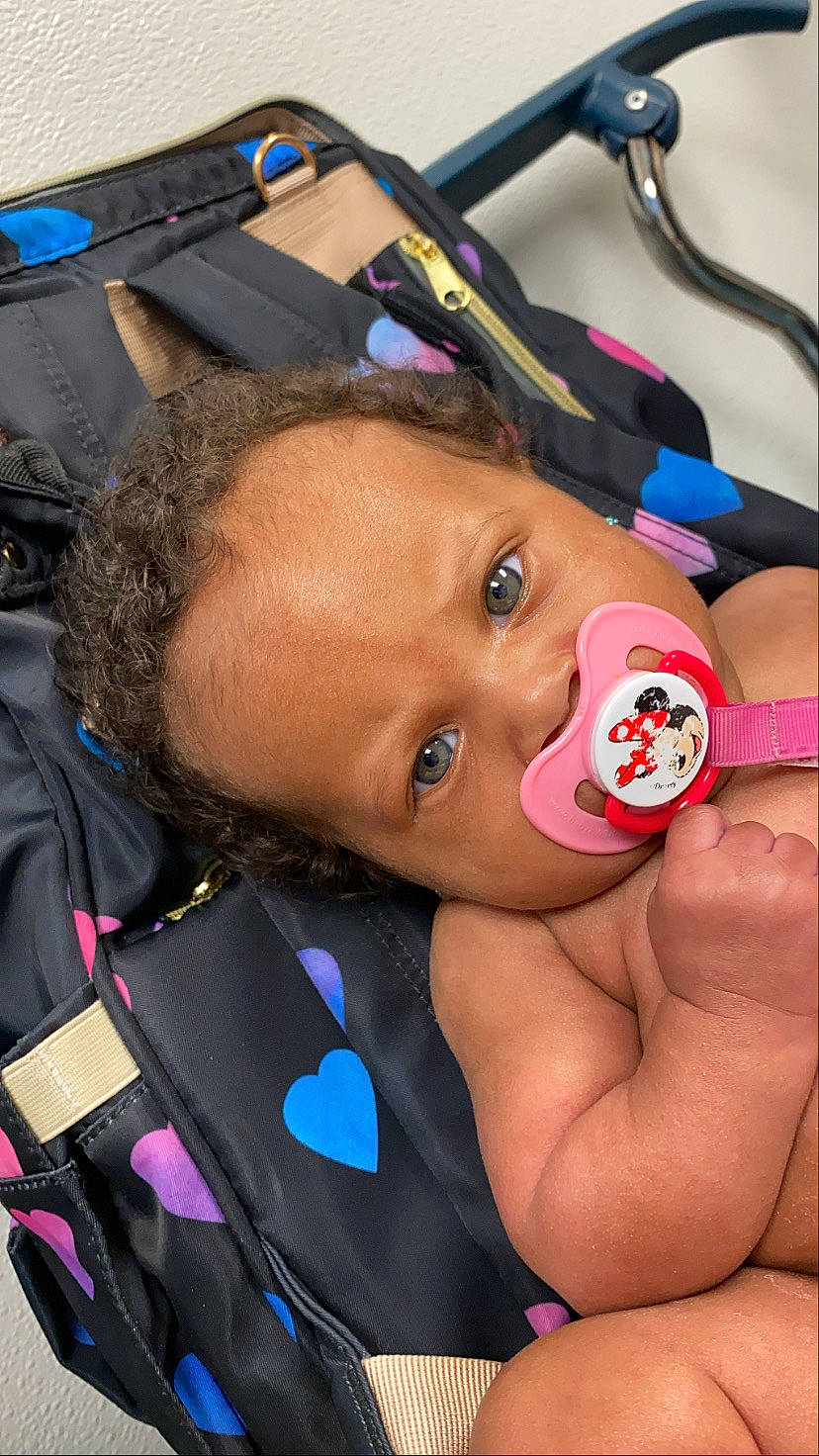 Madisyn joined the competition — help win amazing prizes! car_seat, cheek, lip, mouth, neck, nose, person, throat, tongue