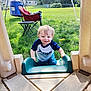 Asher is registered to the contest to win money with this photo: toddler, child, slide, backyard, grass, chair, outdoor, play, smile, happy, sunny, pants, shirt, tent, plastic, green, daytime, climbing, young, casual