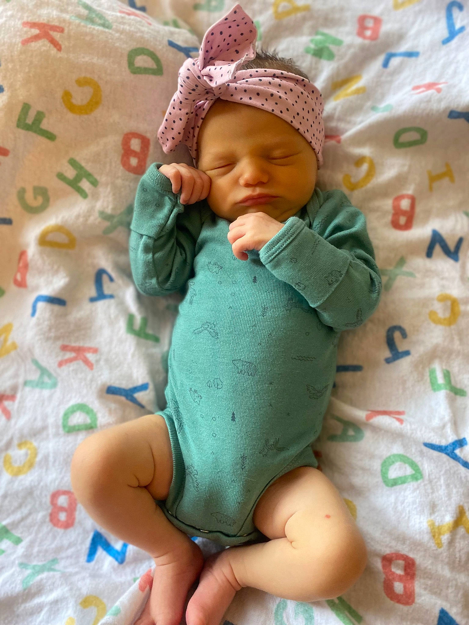 Elizabeth joined the competition — help win amazing prizes! baby, baby_products, baby_sleeping, baby_toddler_clothing, cheek, child, comfort, face, foot, head, headwear, linens, pattern, person, pink, room, skin, sleeve, sock, textile