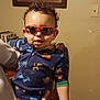 Landan is registered to the contest to win money with this photo: accessories, adult, baby, bodypart, clothing, face, finger, glasses, hand, happy, head, male, man, person, photoframe, photography, portrait, smile, sunglasses, t_shirt
