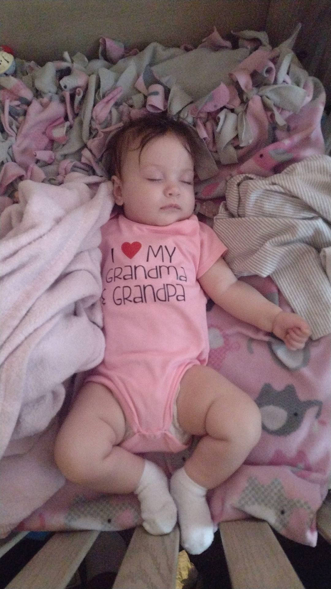 Lilith joined the competition — help win amazing prizes! baby, baby_products, baby_toddler_clothing, cheek, child, comfort, face, finger, hand, head, human_body, iris, linens, mouth, pattern, person, pink, product, skin, sleeve