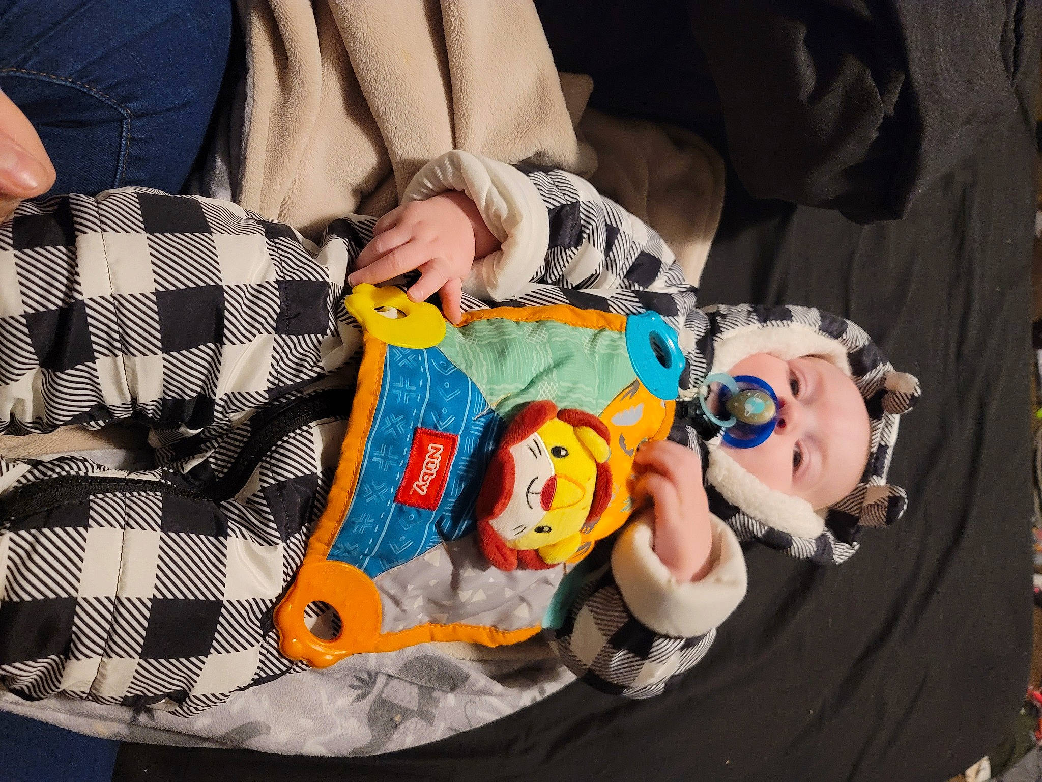 Ashton joined the competition — help win amazing prizes! baby, baby_products, baby_toddler_clothing, child, comfort, fun, linens, mammal, mouth, nail, pattern, person, plaid, sleeve, stuffed_toy, tartan, textile, toddler, toy, vertebrate