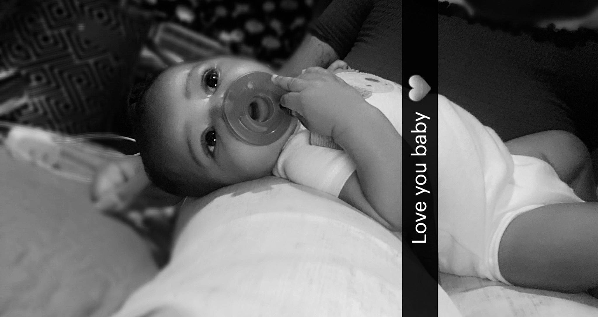 Julio is registered to the contest to win money with this photo: arm, baby, black_and_white, comfort, eyebrow, eyelash, finger, flash_photography, gesture, hand, happy, human_body, lip, monochrome_photography, mouth, nail, nose, person, style, sunglasses