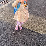 Lilly-Sue joined the competition — help win amazing prizes! asphalt, backpack, car, casual, child, coat, cute, daylight, happy, outdoor, pacifier, person, pink_shoes, playful, pole, sidewalk, smiling, street, toddler, young