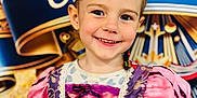 Lilly-Sue joined the competition — help win amazing prizes! child, smiling, portrait, costume, princess_dress, celebration, banner, happy, face, person, event, cute, young, girl, colorful, fabric, clothing, indoors, festive, fun