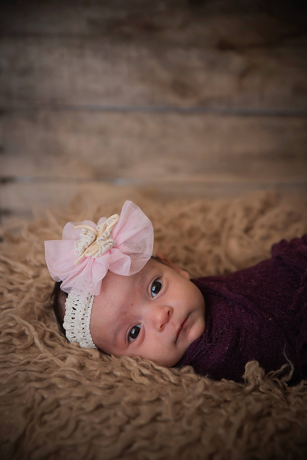 Heaven is registered to the contest to win money with this photo: baby, baby_toddler_clothing, cheek, child, fashion_accessory, flash_photography, fur, grass, happy, hat, headband, headgear, headpiece, headwear, lip, person, portrait, portrait_photography, sitting, skin