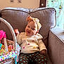 Allison joined the competition — help win amazing prizes! baby, child, infant, headband, polka_dot, pants, sweater, armchair, couch, basket, toy, colorful, playful, indoor, cute, smiling, face, person, furniture, home
