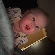 Allison joined the competition — help win amazing prizes! baby, child, smiling, blanket, indoors, face, cute, happy, person, infant, soft, pajamas, room, door, light, expression, closeup, head, skin, young