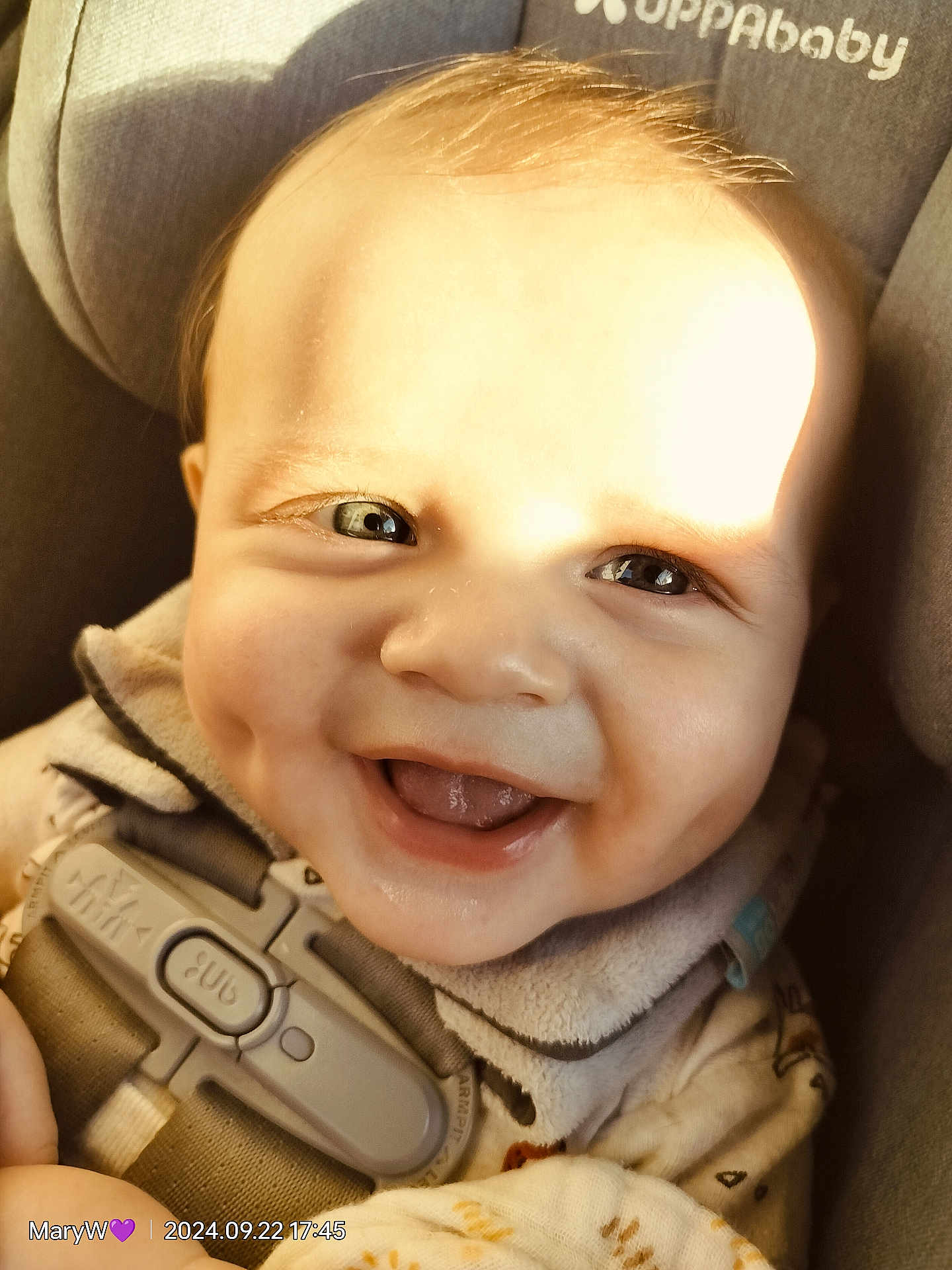 Daymian is registered to the contest to win money with this photo: baby, babylaughing, bodypart, car, car_interior, face, finger, gun, hand, happy, head, laughing, mouth, person, photography, portrait, smile, transportation, vehicle, weapon