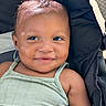baby, infant, child, smiling, portrait, face, eyes, hair, earring, clothing, tank_top, stroller, seated, indoors, sunlight, close_up, happy, cute, baby_carriage, photography