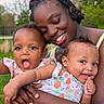 mother, babies, infants, family, portrait, selfie, smiling, happy, outdoor, park, trees, grass, cuddling, hugging, sibling, baby_girl, floral_dress, braided_hair, thumbs_up, joyful