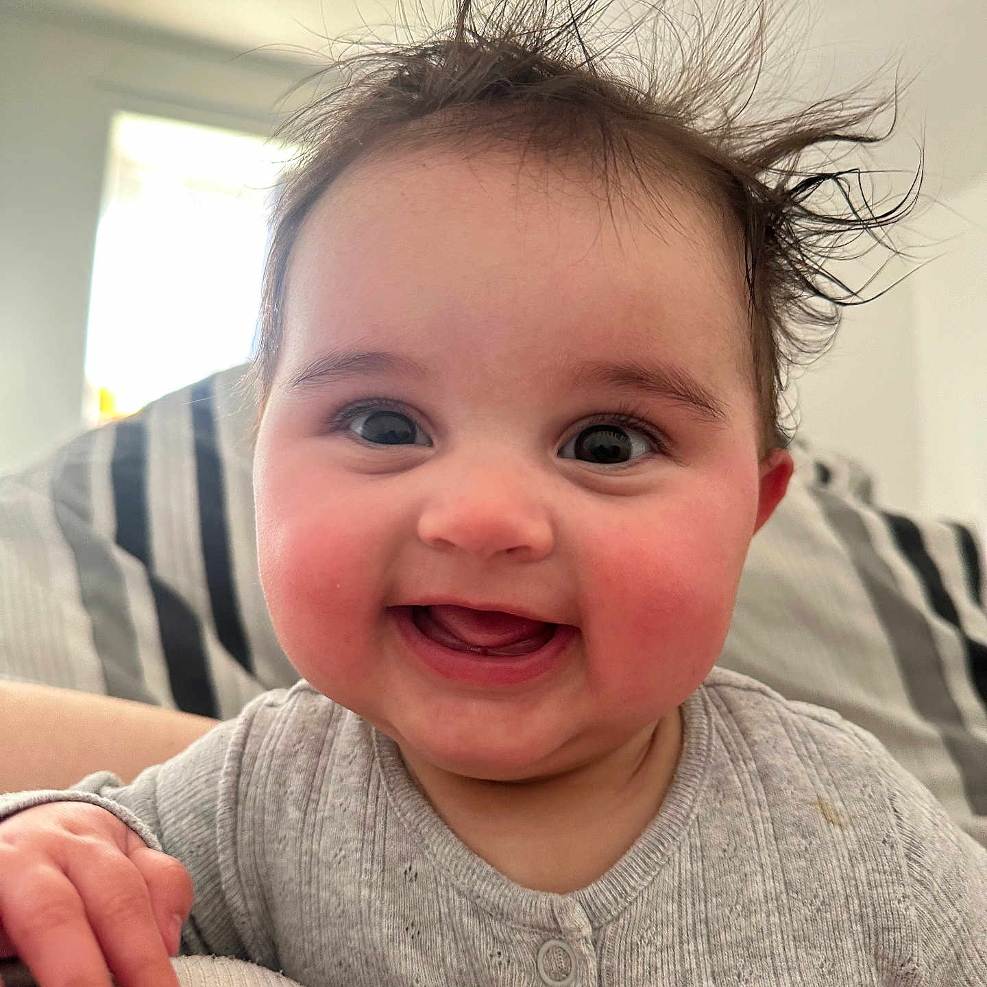 Azeliah-Jean joined the competition — help win amazing prizes! accessories, baby, babylaughing, bodypart, clothing, face, finger, hand, happy, head, jewelry, knitwear, laughing, mouth, person, photography, portrait, smile, sweater, teeth