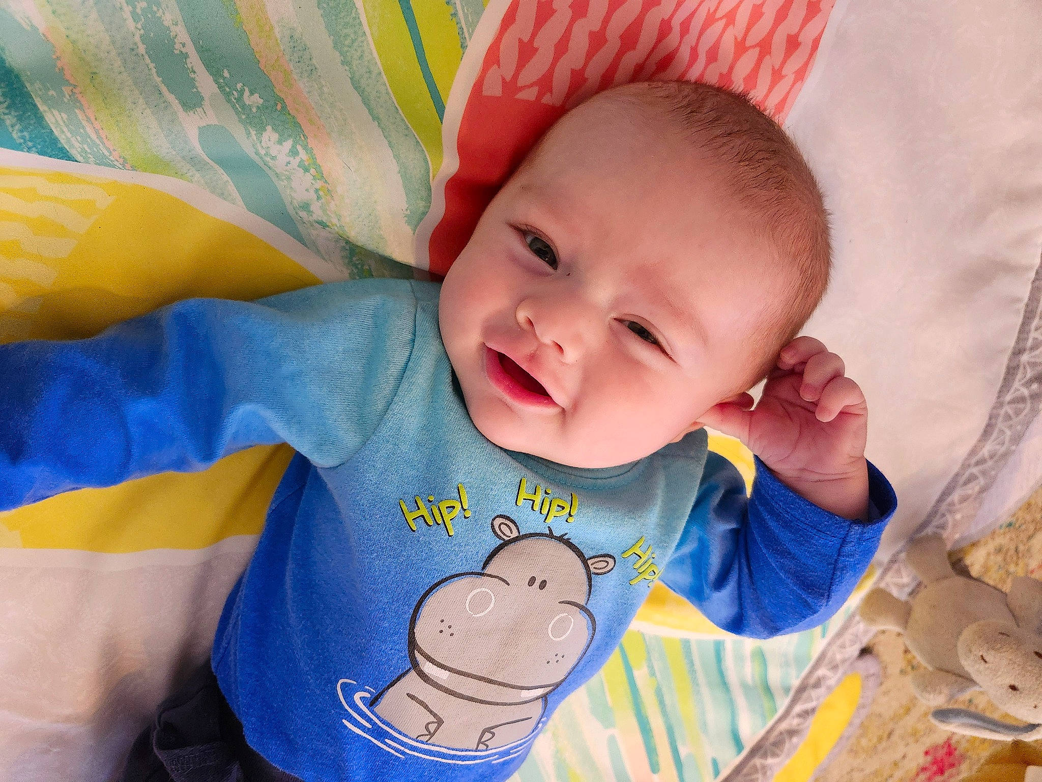 Levi Axel is registered to the contest to win money with this photo: baby, baby_products, baby_toddler_clothing, cheek, chin, comfort, eye, eyebrow, face, finger, happy, head, human_body, iris, lip, nose, person, skin, sleeve, smile