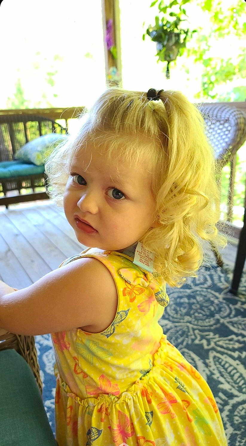 Ryleekay is registered to the contest to win money with this photo: baby, blond, brown_hair, cheek, child, child_model, ear, eye, face, hair, hairstyle, long_hair, neck, nose, person, play, skin, smile, toddler, yellow