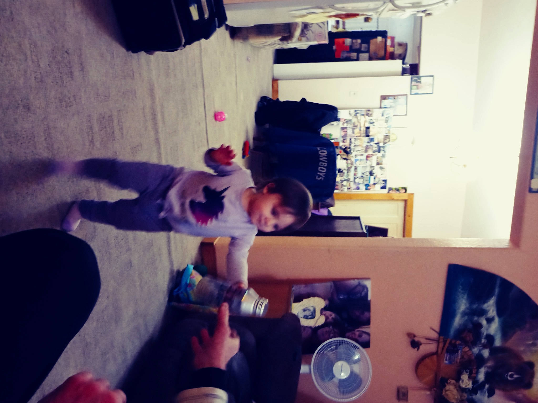 Temperence is registered to the contest to win money with this photo: child, cloud, cool, eyewear, flooring, fun, happy, hat, house, light, metal, person, play, purple, room, sitting, snapshot, square, table, toddler