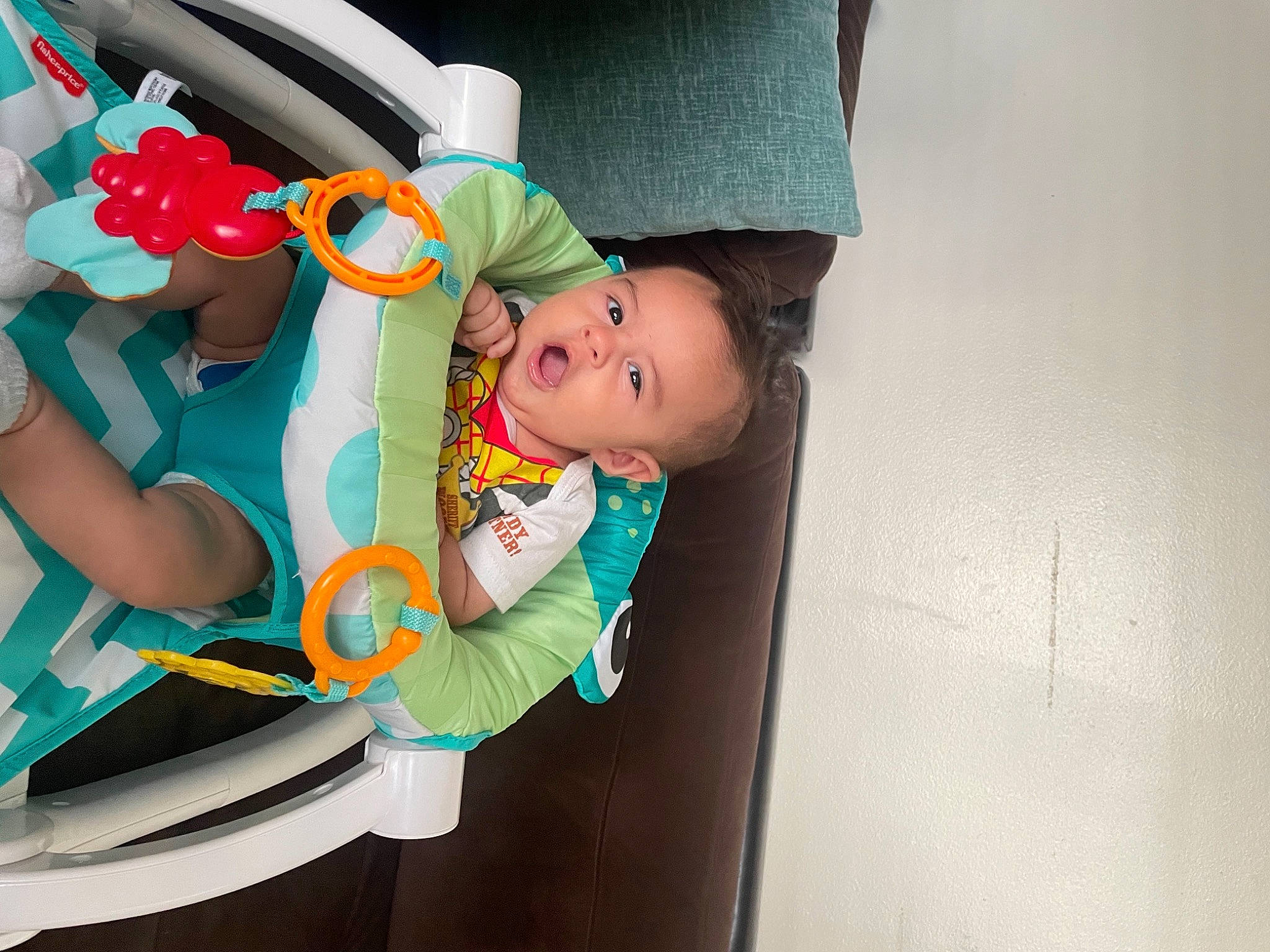 Bryson is registered to the contest to win money with this photo: auto_part, baby, baby_carriage, baby_products, baby_safety, baby_toddler_clothing, cap, car_seat, child, fashion_accessory, fun, happy, hat, leisure, person, personal_protective_equipment, play, room, sun_hat, t_shirt