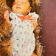 Jase joined the competition — help win amazing prizes! baby, sleeping, newborn, fur_blanket, cozy, infant, cute, white_outfit, bow_tie, nautical_theme, anchor, life_preserver, sailboat, soft_texture, peaceful, portrait, child, resting, indoors, comfort