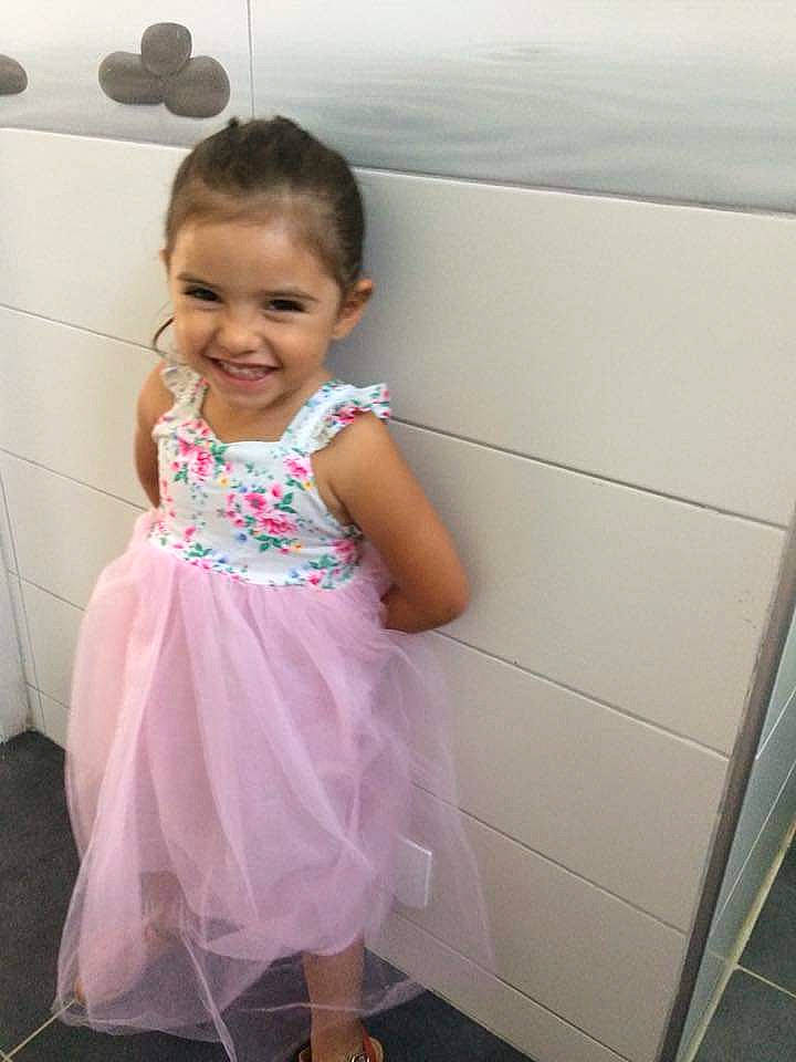 Amel participe au concours pour gagner de l'argent avec cette photo : baby_toddler_clothing, day_dress, dress, eye, facial_expression, flash_photography, fun, gesture, hair, hairstyle, happy, joy, magenta, neck, one_piece_garment, person, pink, shoulder, skin, sleeve