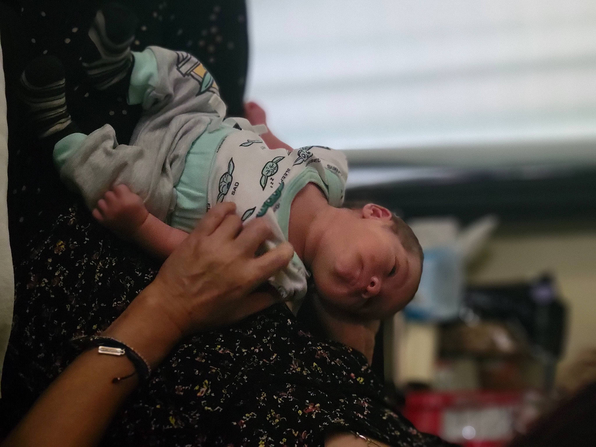 Etienne is registered to the contest to win money with this photo: abdomen, army, baby, bracelet, child, elbow, event, finger, fun, gesture, jewellery, military, military_camouflage, nail, pattern, person, recreation, sitting, soldier, toddler