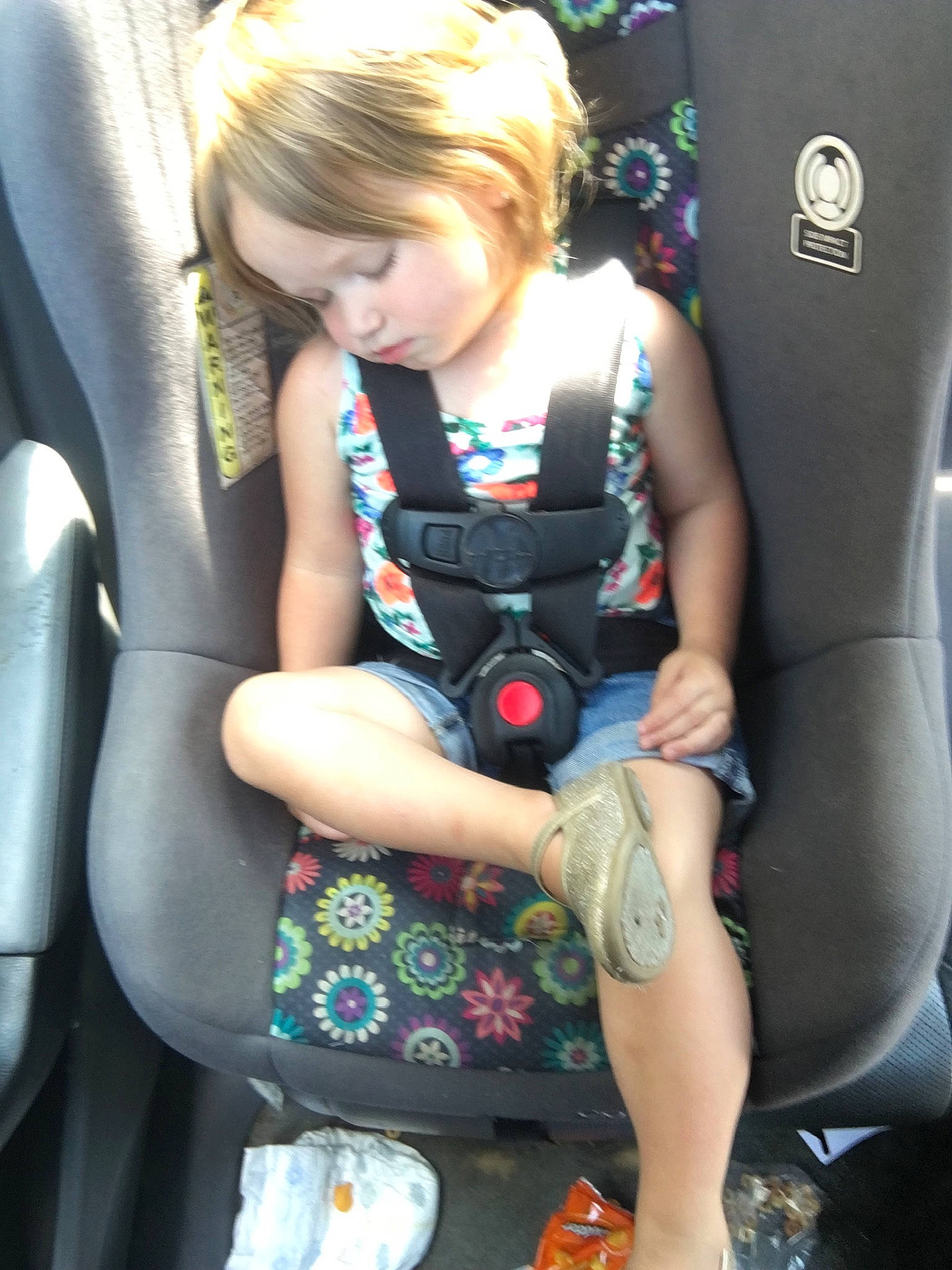 Natalya is registered to the contest to win money with this photo: auto_part, car_seat, child, seat_belt, sitting, toddler, vacation