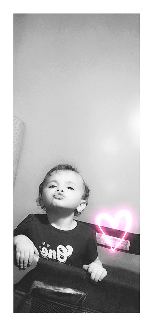 Sarah joined the competition — help win amazing prizes! child, darkness, eyewear, flash_photography, fun, gesture, happy, light_fixture, monochrome, monochrome_photography, person, photo_shoot, portrait, portrait_photography, room, sitting, smile, still_life_photography, stock_photography, t_shirt