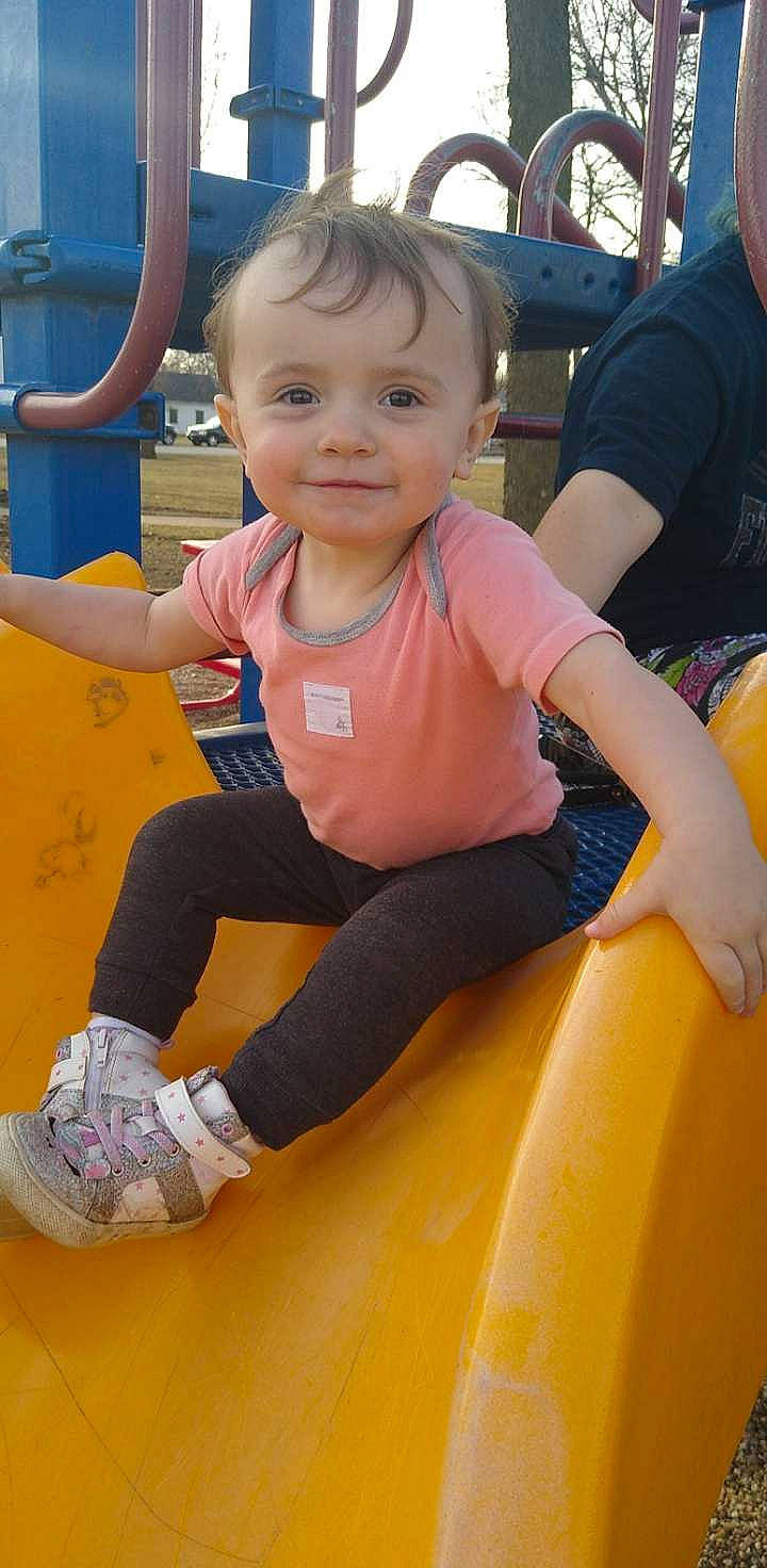 Sarah is registered to the contest to win money with this photo: baby_toddler_clothing, beauty, child, city, facial_expression, finger, fun, happy, joy, leg, leisure, people, person, photograph, playground, recreation, skin, smile, snapshot, t_shirt