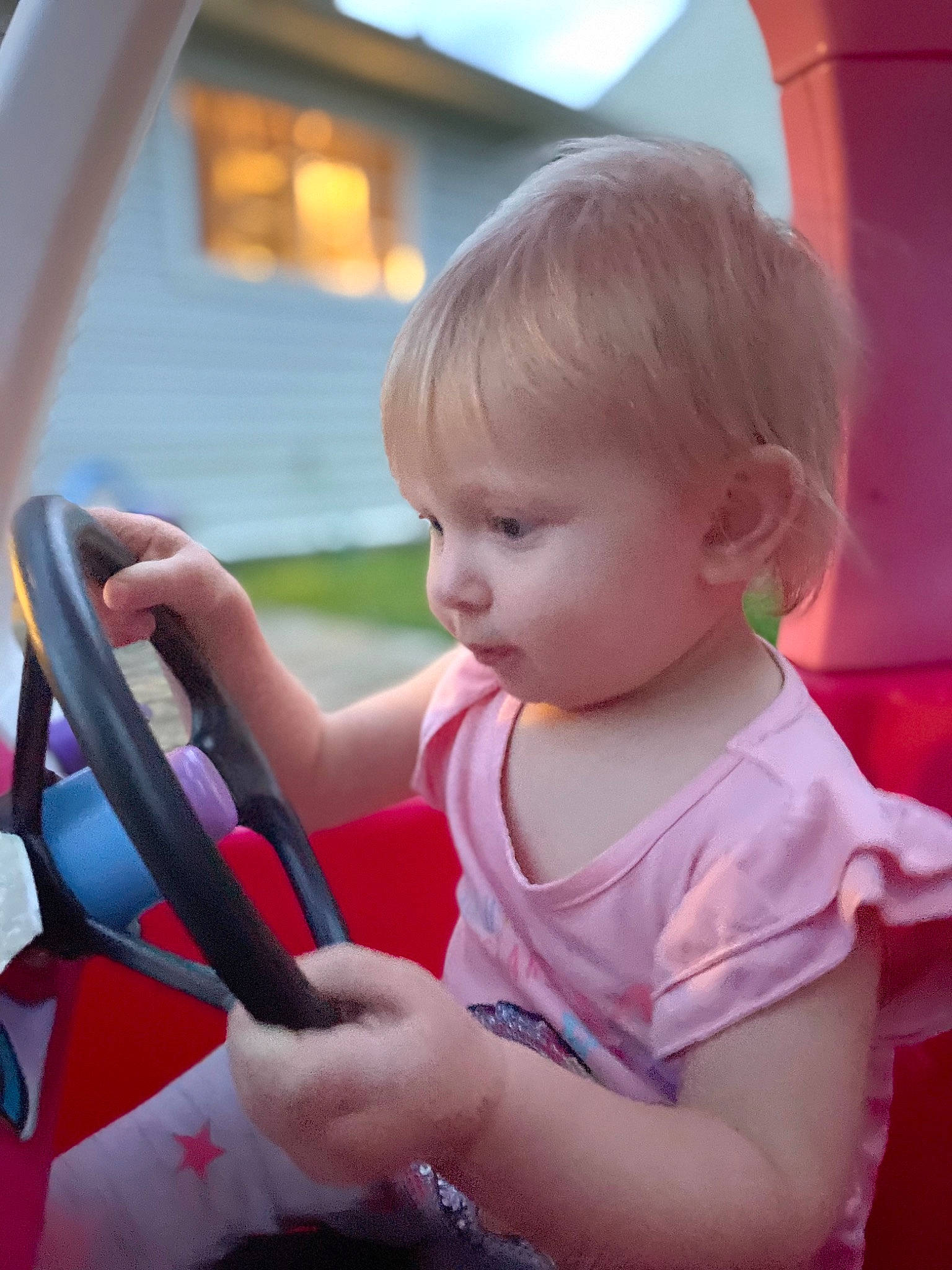 Josephine joined the competition — help win amazing prizes! automotive_exterior, automotive_mirror, baby, baby_toddler_clothing, blond, car, child, dress, fun, happy, human_body, motor_vehicle, person, skin, sky, steering_wheel, toddler, vehicle, vehicle_door, wheel