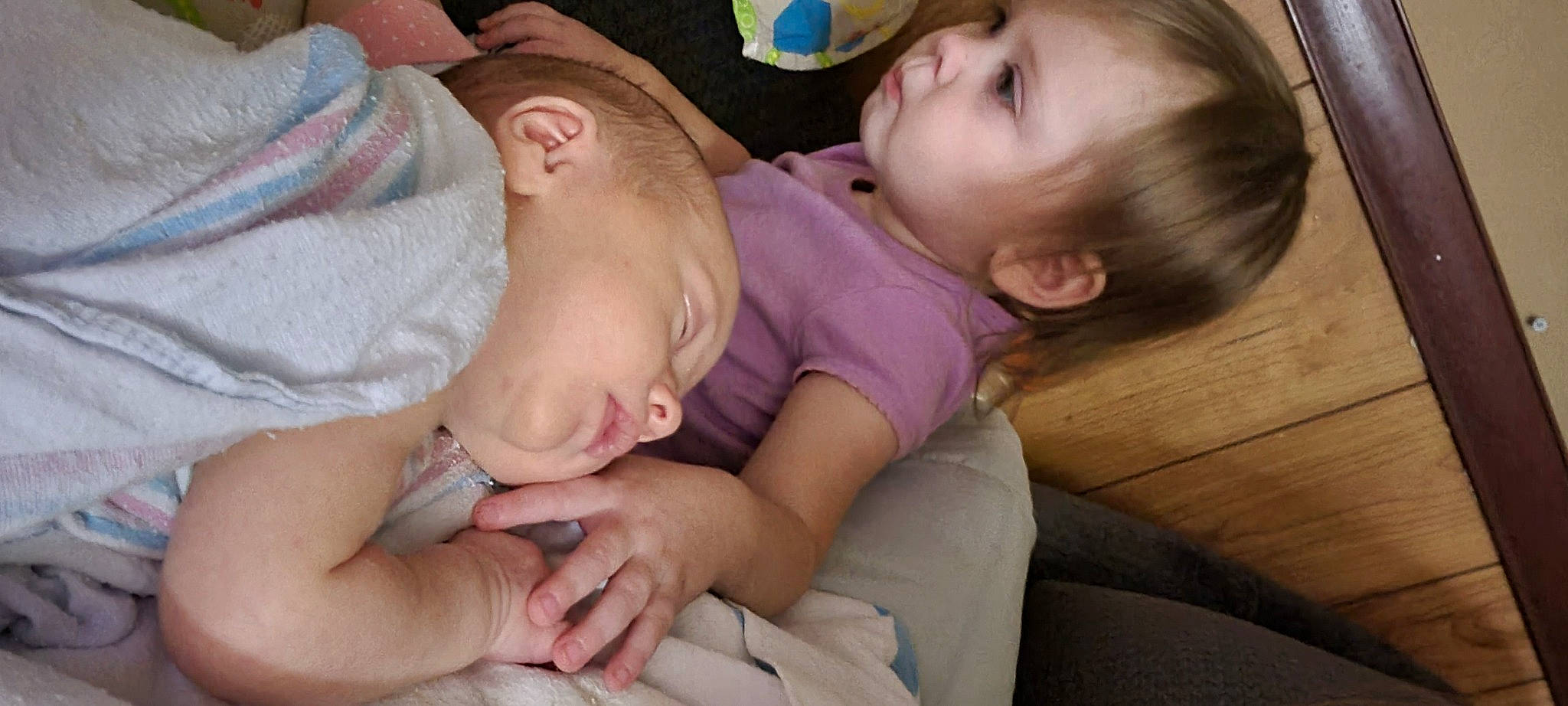 Annaliese is registered to the contest to win money with this photo: baby, cheek, chin, comfort, ear, eye, eyebrow, face, facial_expression, gesture, hair, hand, head, iris, lip, mouth, neck, nose, person, product