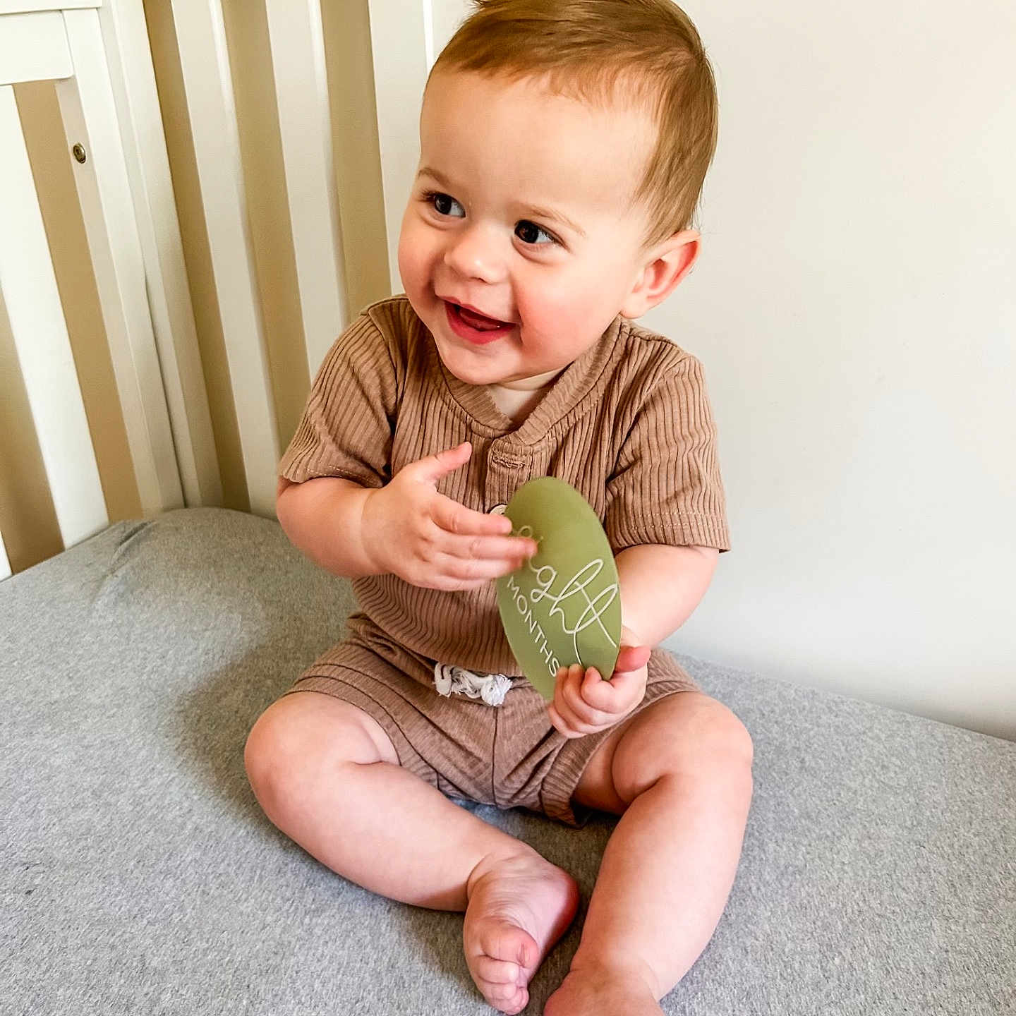 Wyatt joined the competition — help win amazing prizes! baby, bodypart, clothing, face, finger, furniture, hand, happy, head, homedecor, indoors, laughing, pants, person, photography, portrait, shorts, sitting, smile, t_shirt